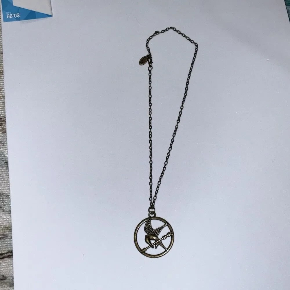 HUNGER GAMES Katniss Mockingjay Pendant Necklace Officially Licensed 2012 NEW